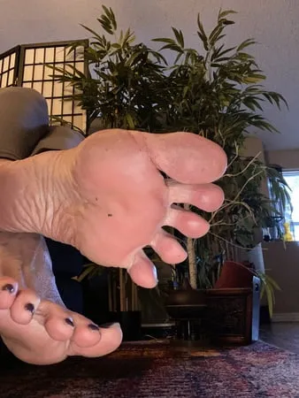 closeups dirty clean soles and toes         