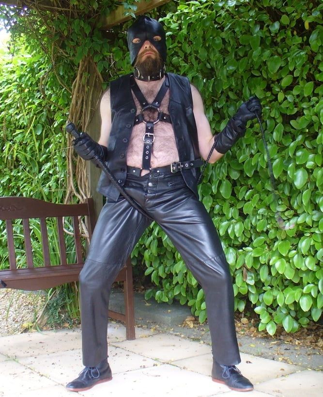 Leather Master outdoors in harness with whip #3