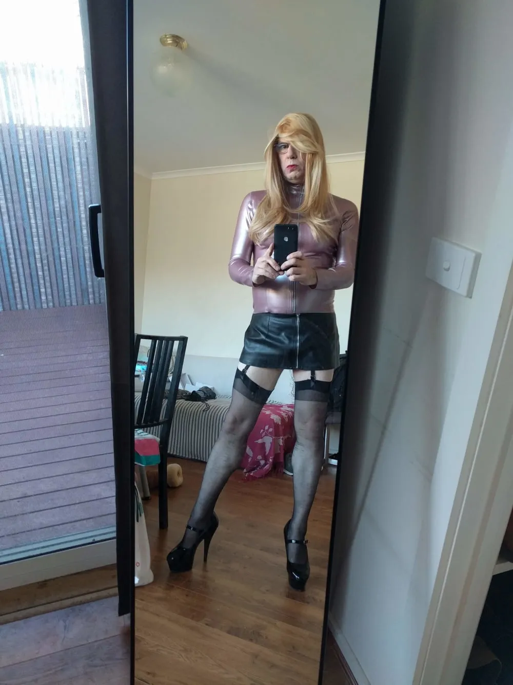 Rose latex top , long blonde full body shots