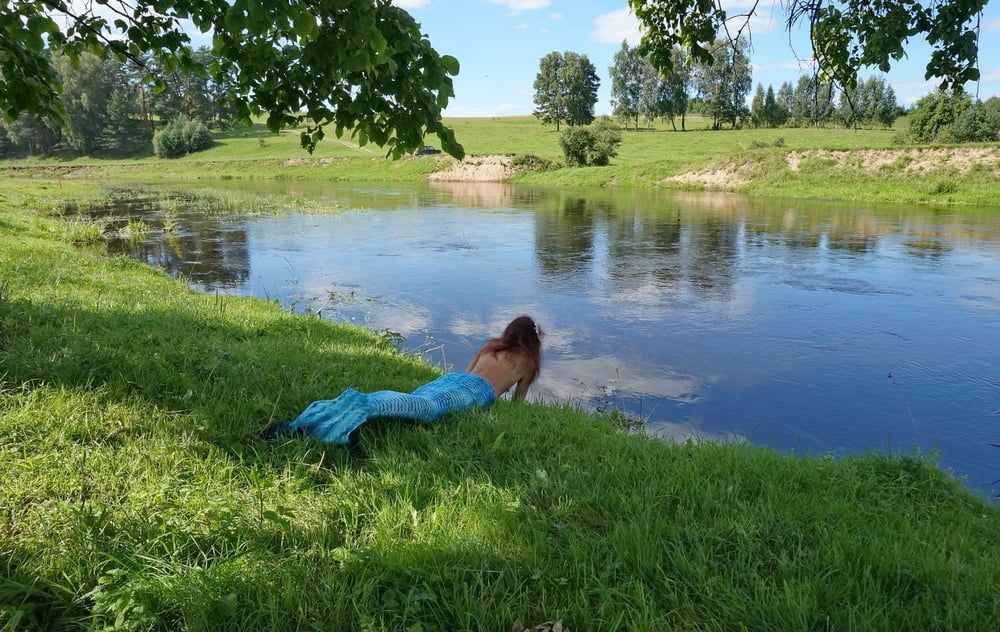 Mermaid plays with water #59