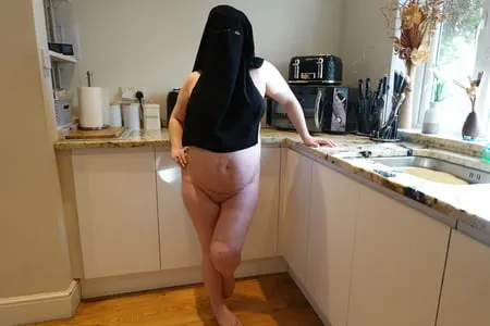 pregnant wife in muslim niqab and nursing bra         