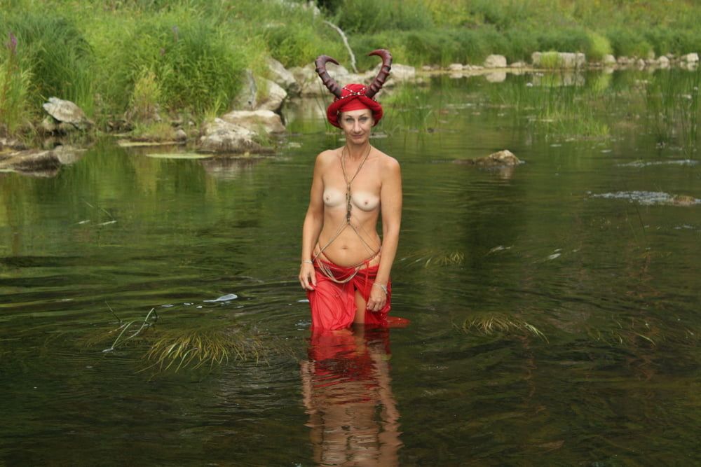 With Horns In Red Dress In Shallow River #60