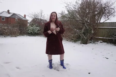 pregnant flashing naked in the cold snow         