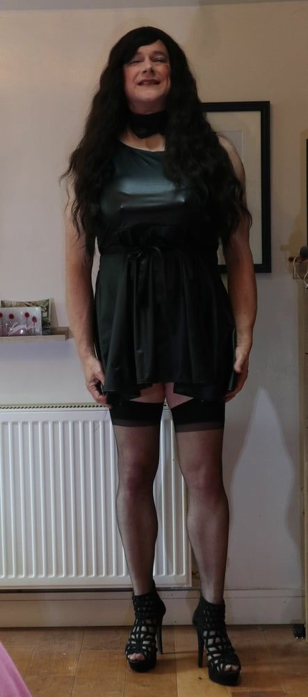 sissy in black stockings and short dress #9