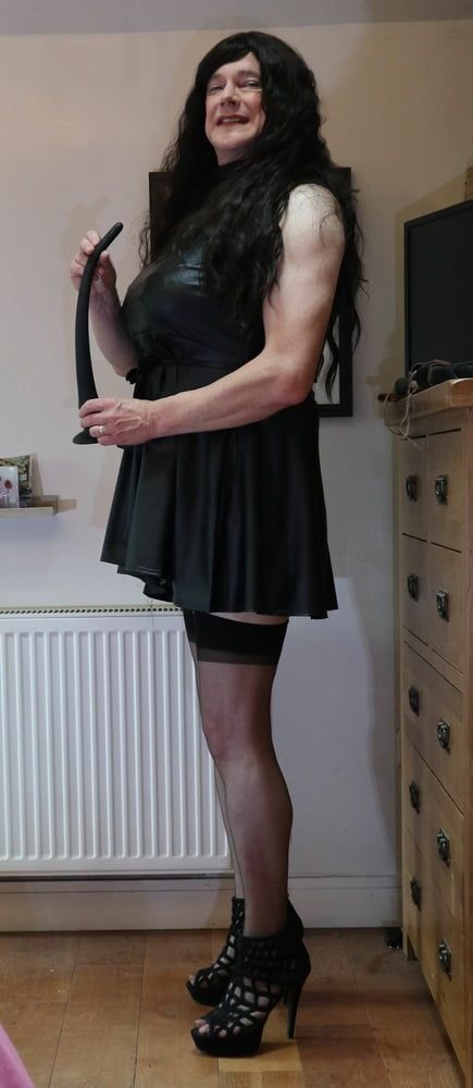 sissy in black stockings and short dress #26