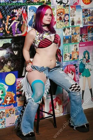 anime junkie girl doing strip tease        