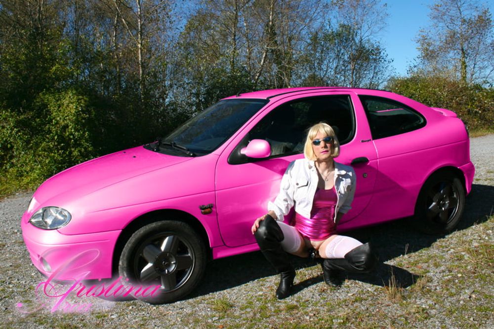 Slutty sissy in a photoshoot with her car... #18