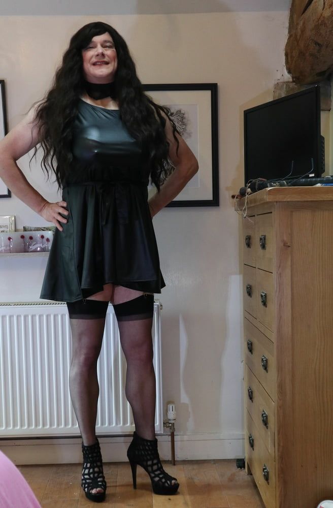 sissy in black stockings and short dress