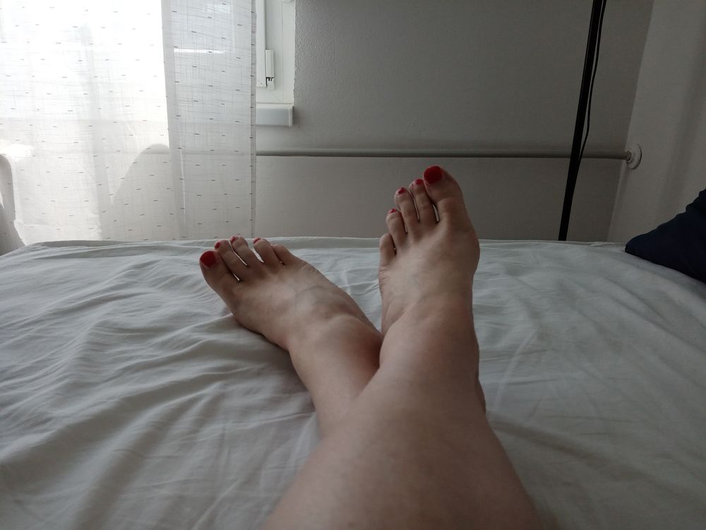 MILF tranny shows off her feet with red painted toes #4