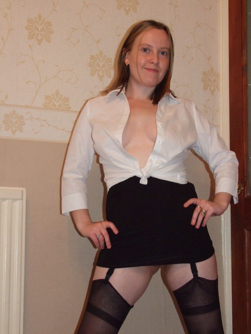 Secretary in heels miniskirt stockings and suspenders  #8