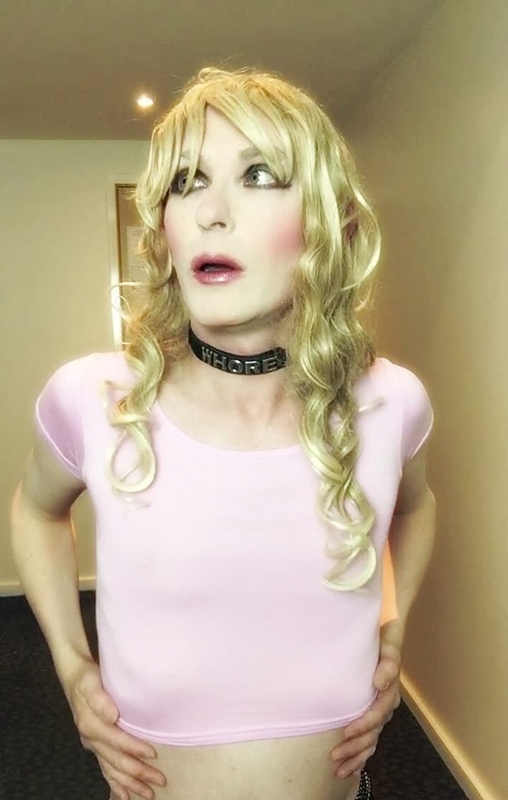 Sissy Sandra in pink top posing #12