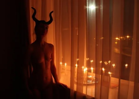 naked maleficent with candles         