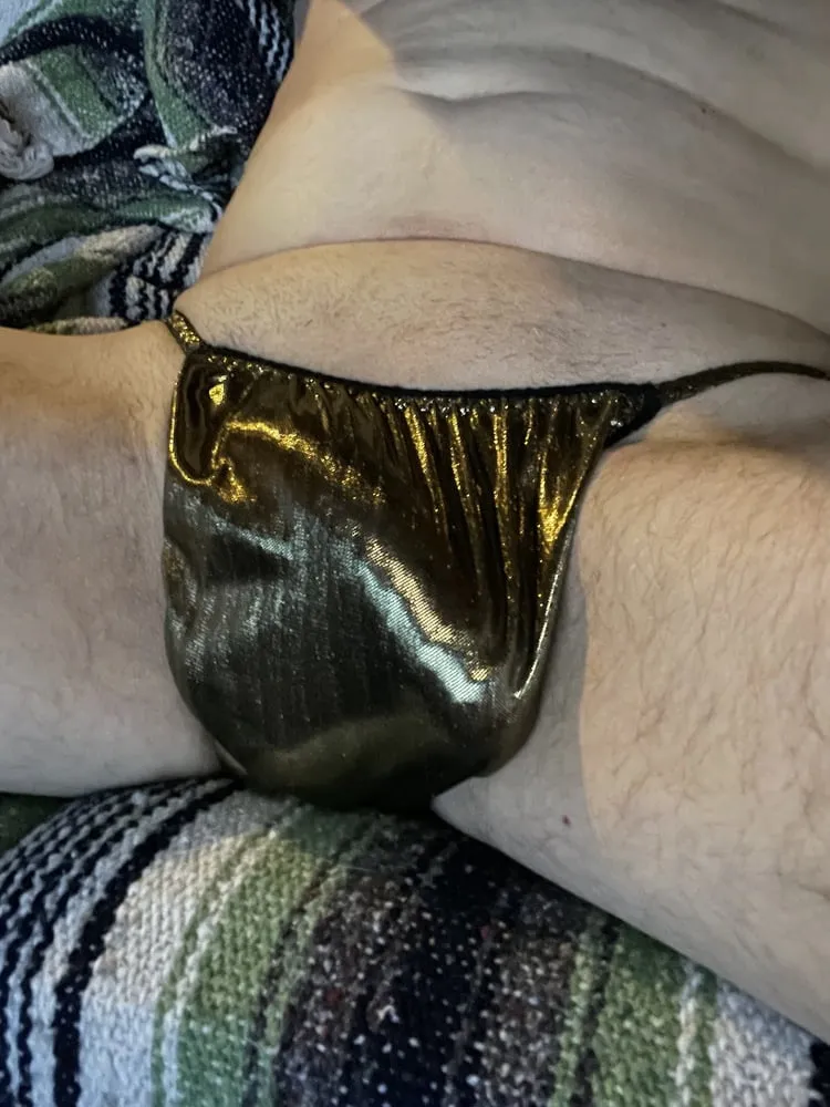 Hard cock in shiny gold panties