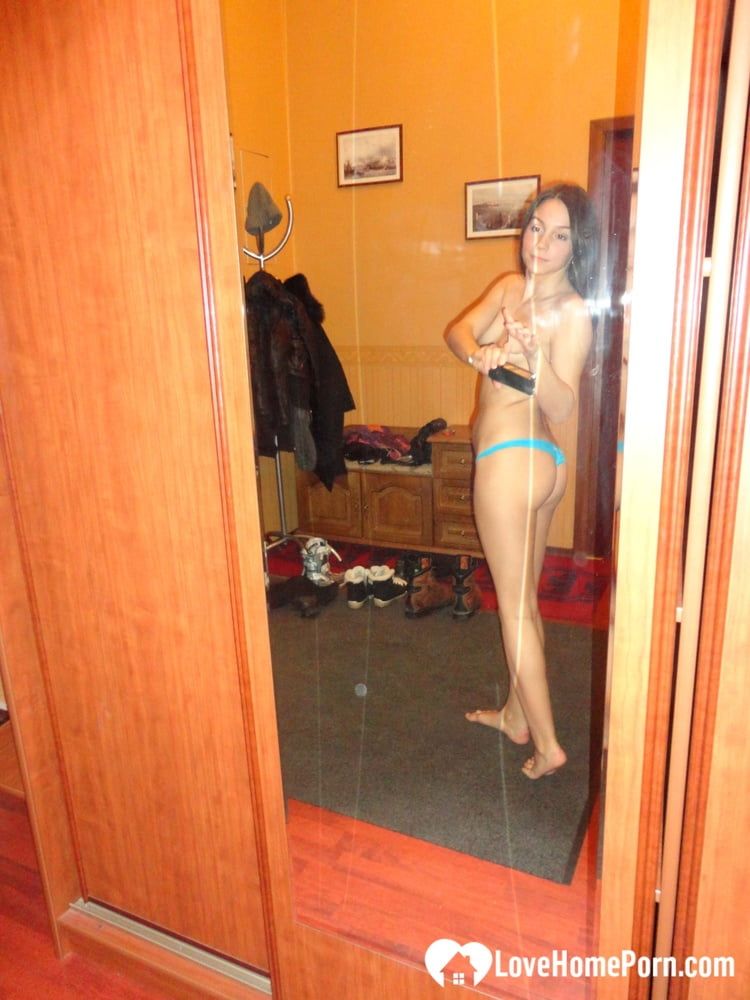 Hot teen shows her body in the mirror #16