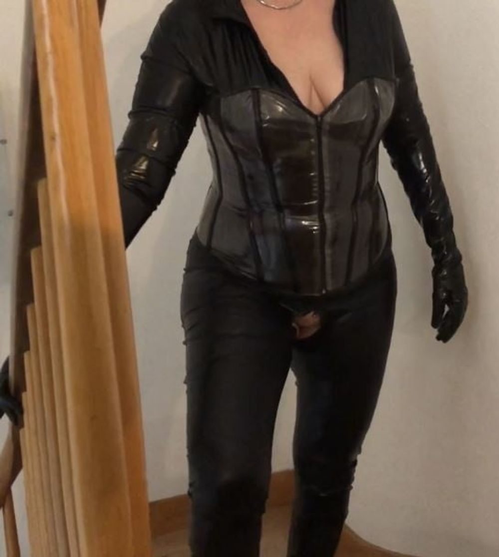 Catsuit, Boots, Corset and Pissing