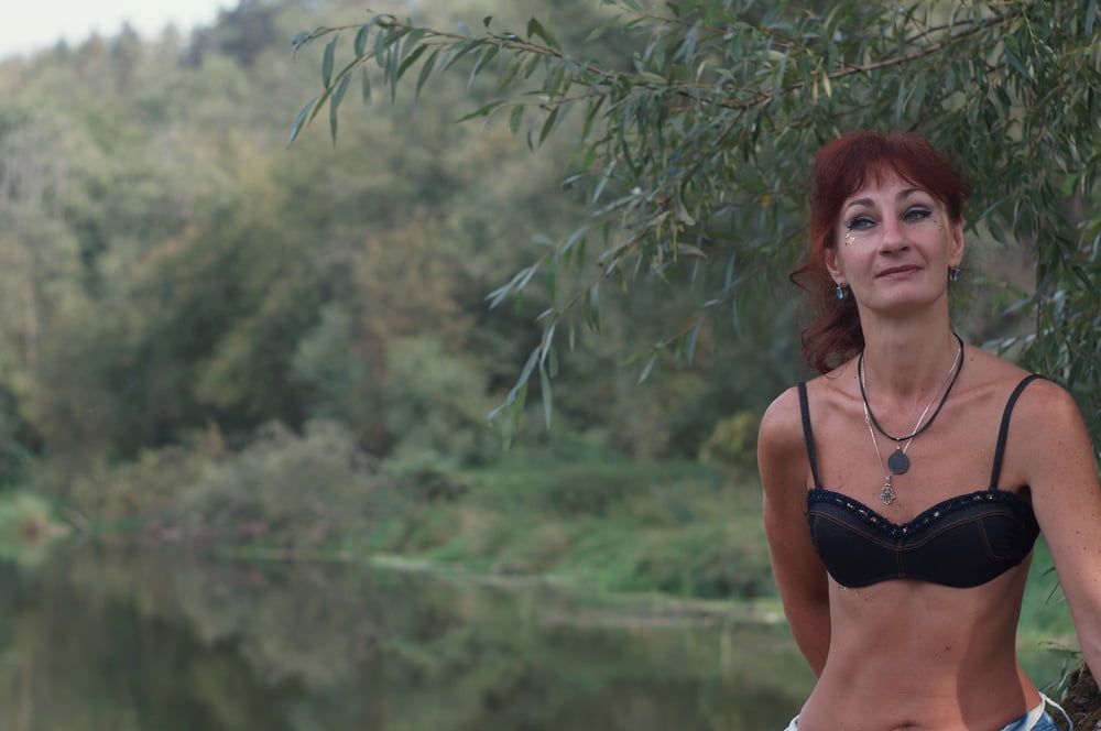 Black bikini near tree upon river #6