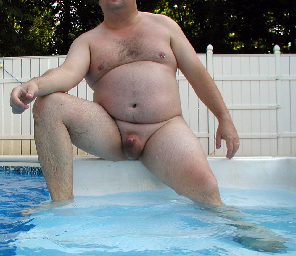 Chubby Guy Suns His Small Shaved Cock By The Pool #4