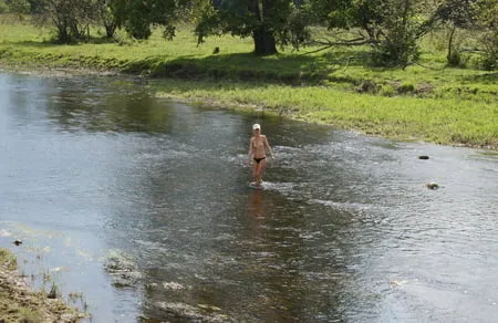 nude in rivers water         