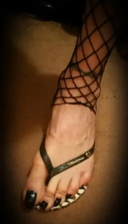 asian ts black toenails and fishnet         