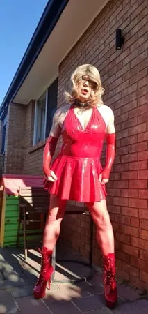 rachel wears red pvc dress         