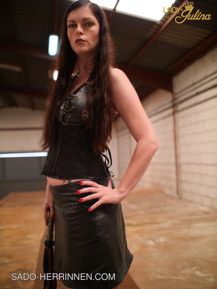 Mistress Lady Julina wears leather skirt and pantyhose #3