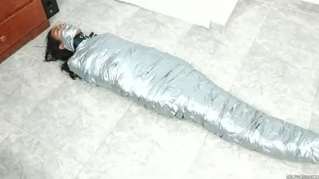 heavily duct tape mummified by crazy bondage women         