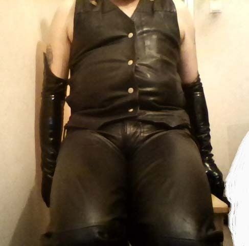 DRESSED IN BLACK TIGHT LEATHER. #49
