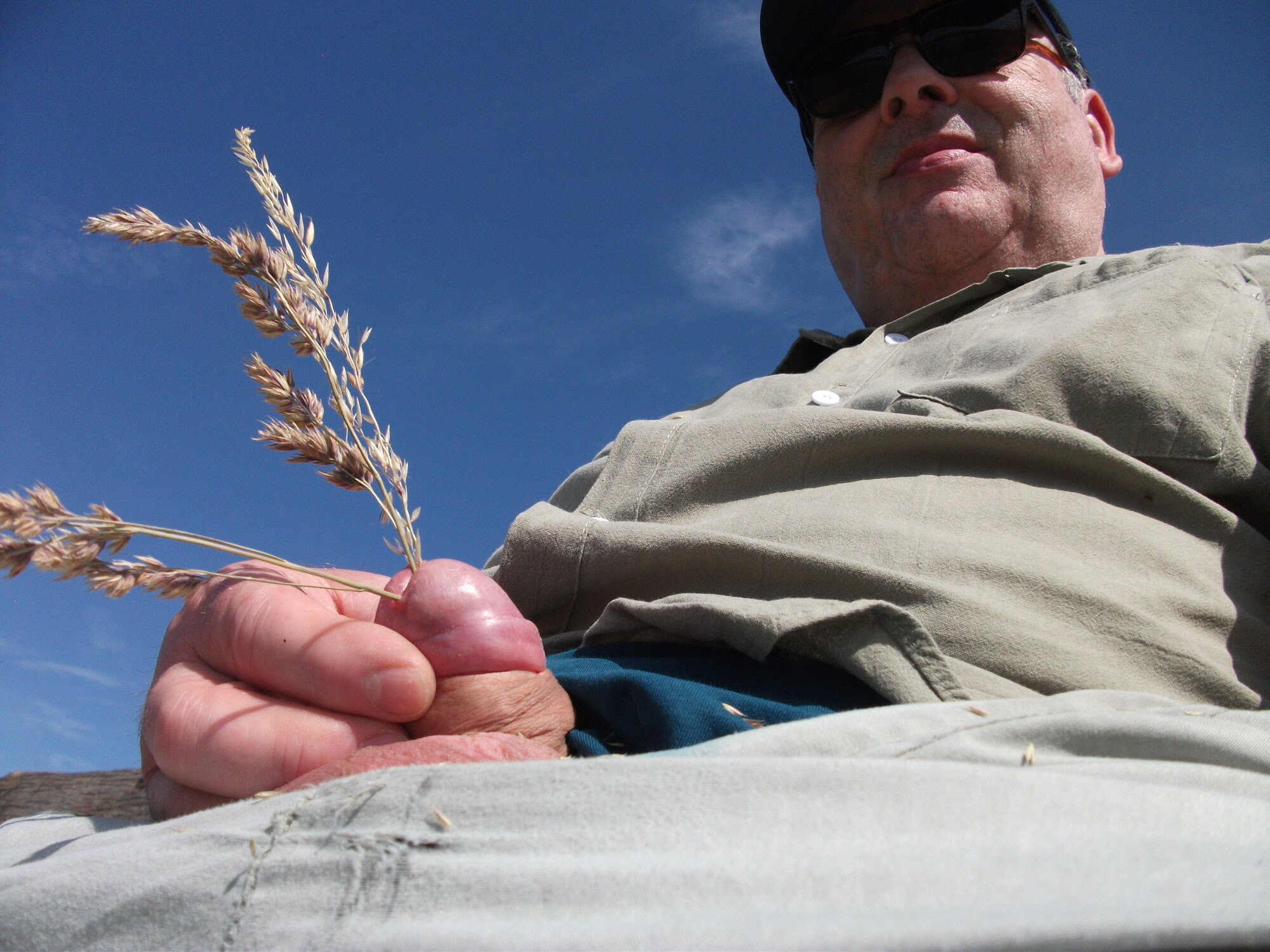 Outdoor activities. Sticking blades of grass into the pee ho #6