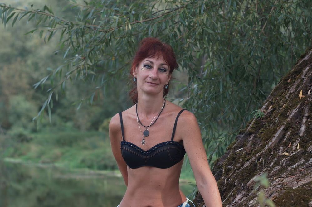 Black bikini near tree upon river #9