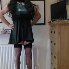 sissy in black stockings and short dress