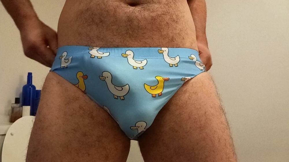 Small penis bulge cum in cute duck speedo, brief, trunks. #12