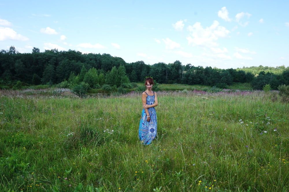 In blue dress in field #47