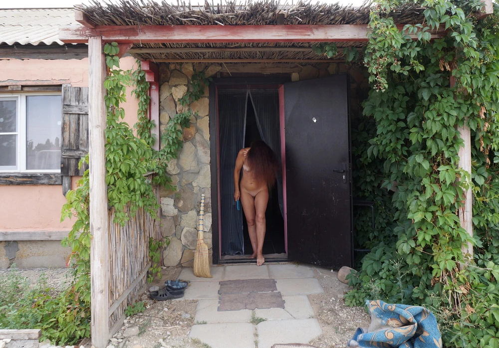 Nude on porch #12