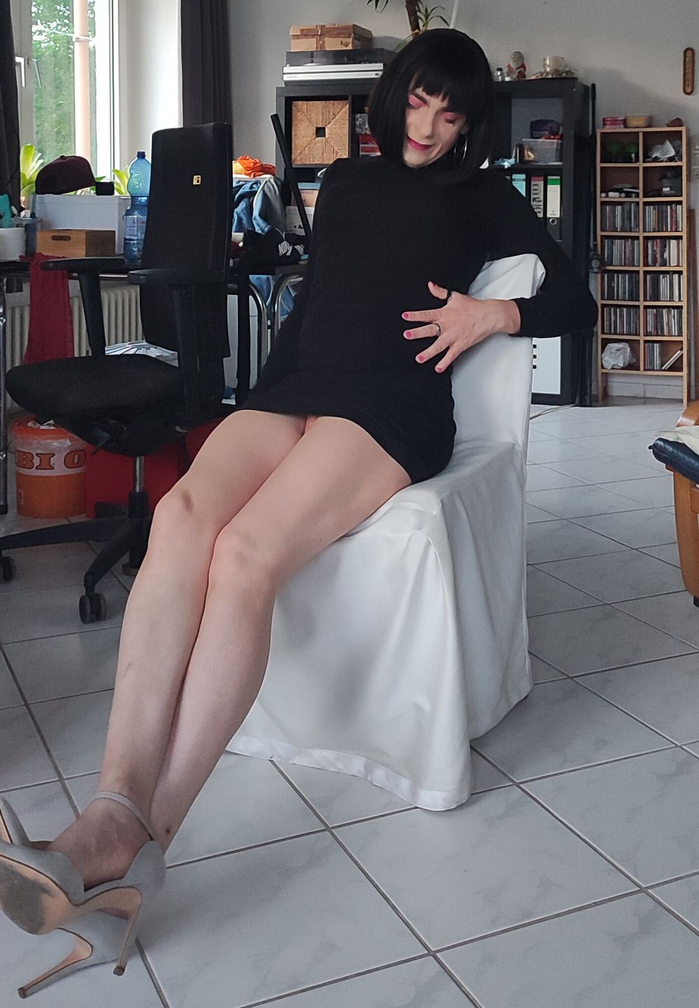 German slut in a tight miniskirt showing off her shaved clit #8