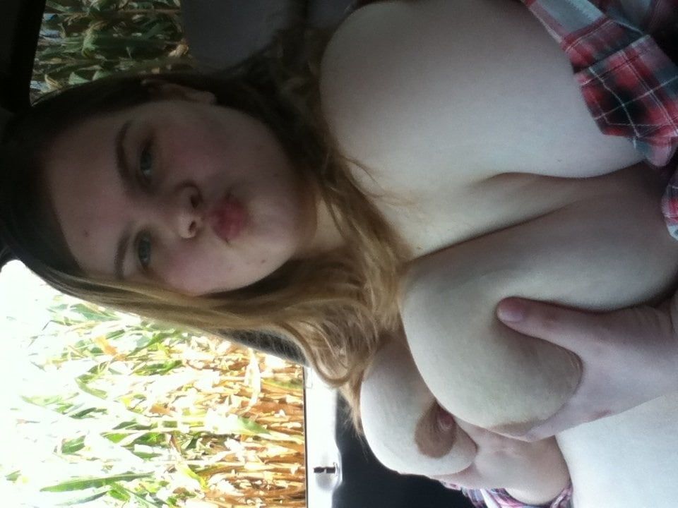Fun in the car showing my tits off #7