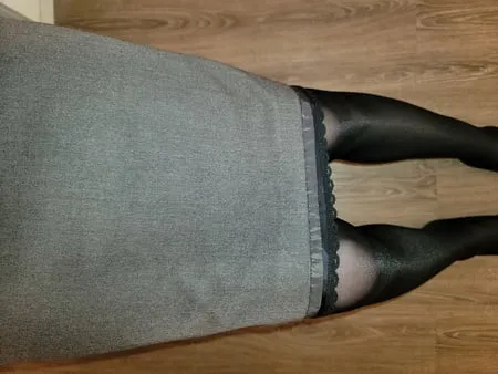 grey pencil skirt with black silky half slip         