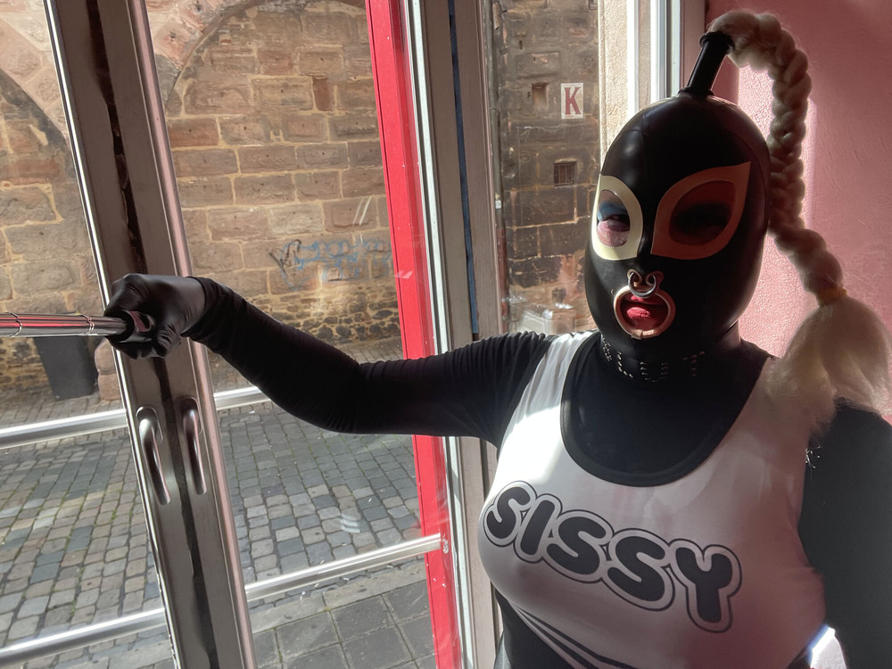 I'm sitting in the window of the red light district #8