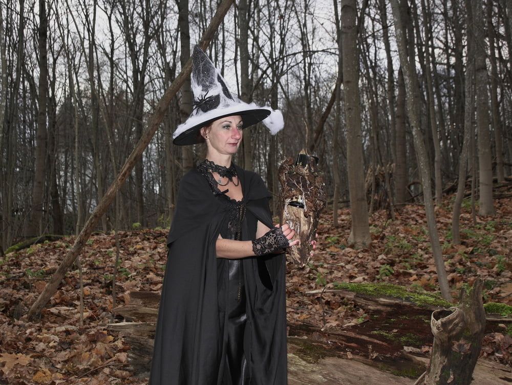 Witch with broom in forest #24