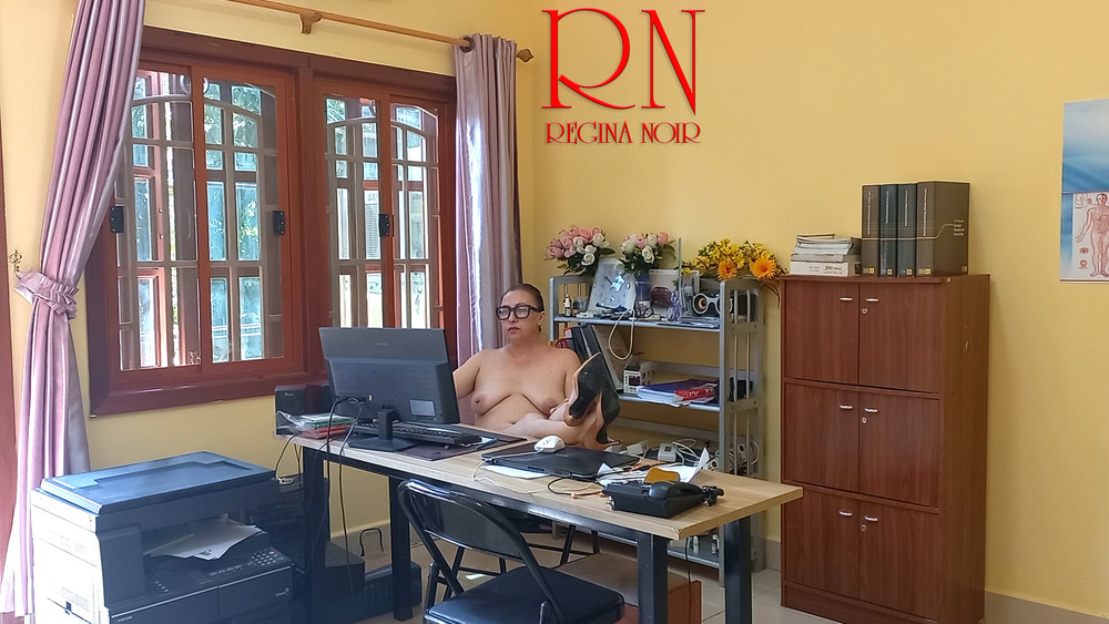 The naked secretary is cleaning up the office. Voyeur camera #9