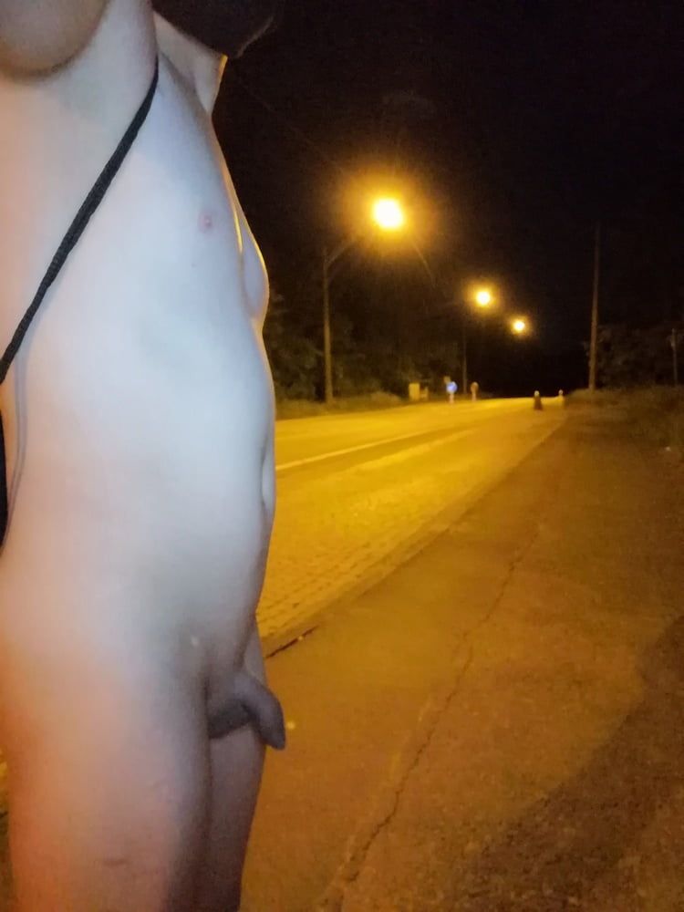 Naked at the bus stop at night