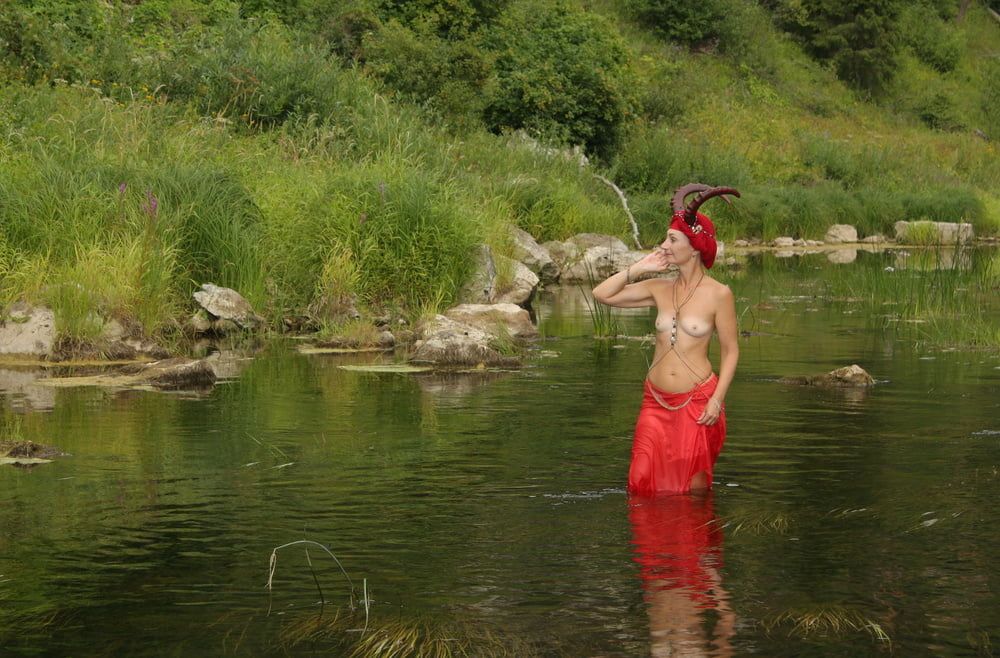 With Horns In Red Dress In Shallow River #14