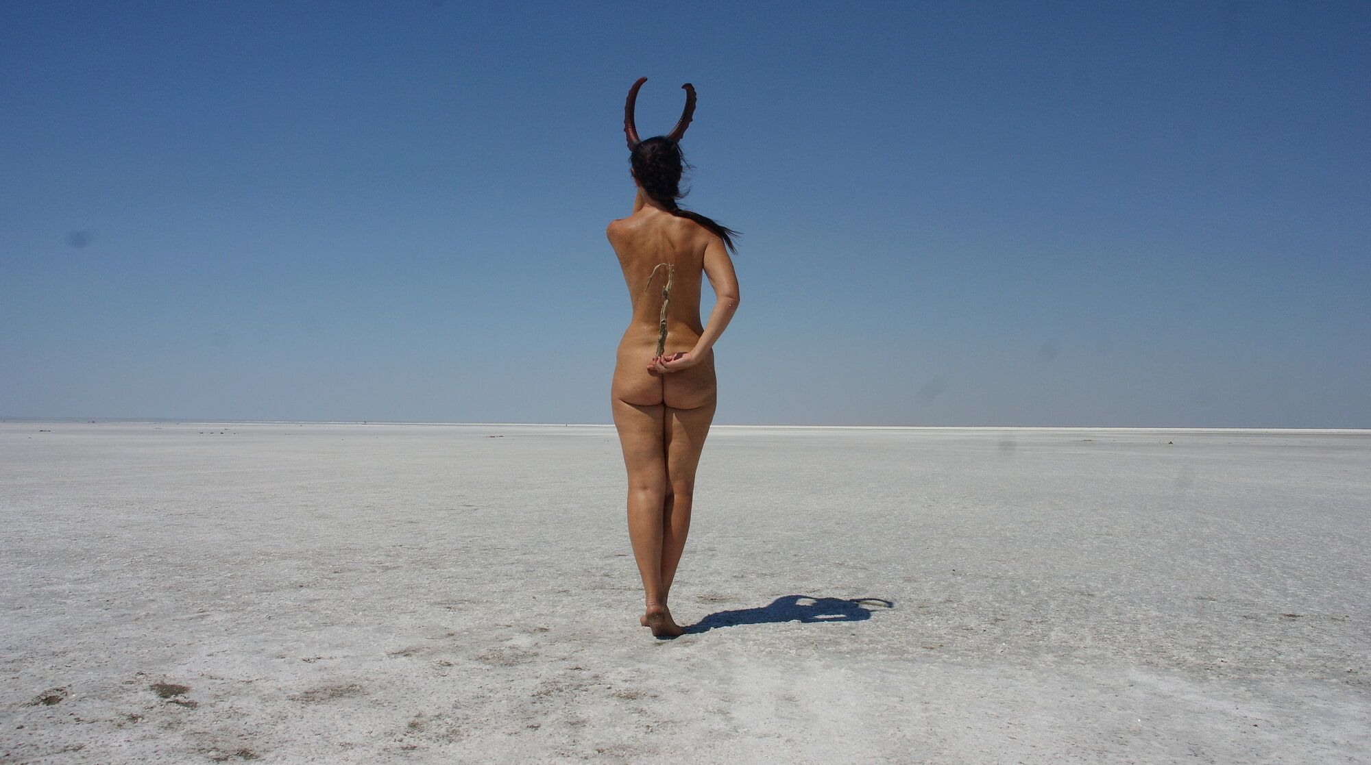 Standing naked on the salt of the salt lake Elton #18