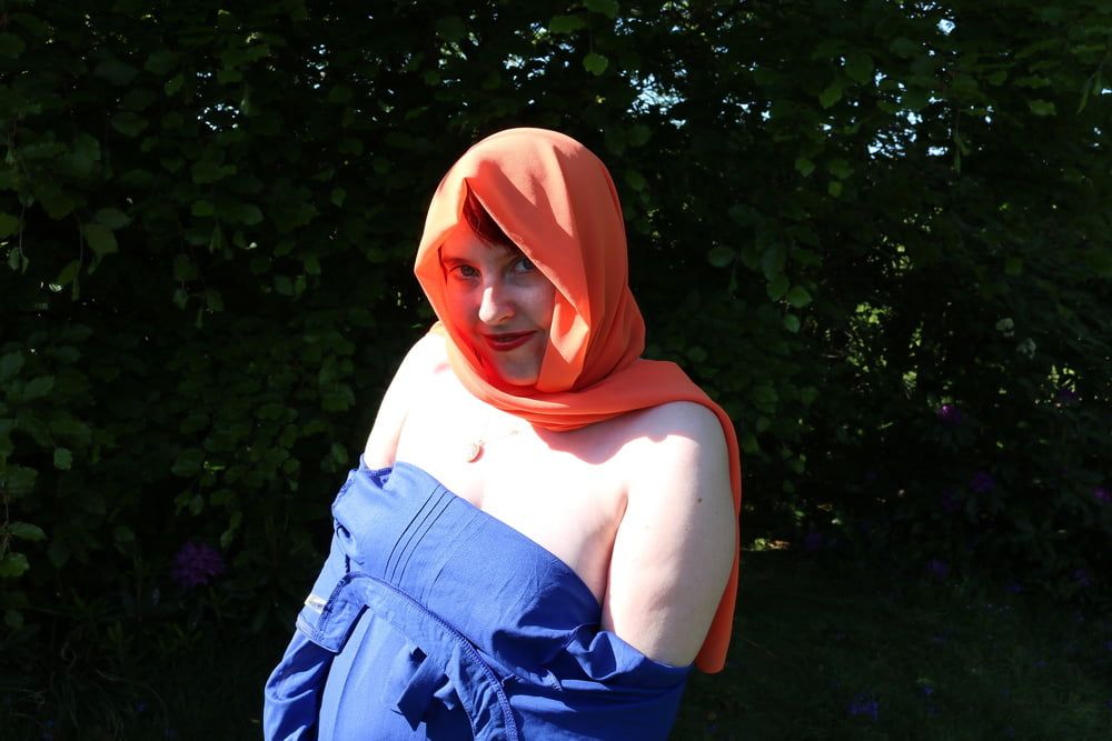 hijab and abaya flashing outdoors #29
