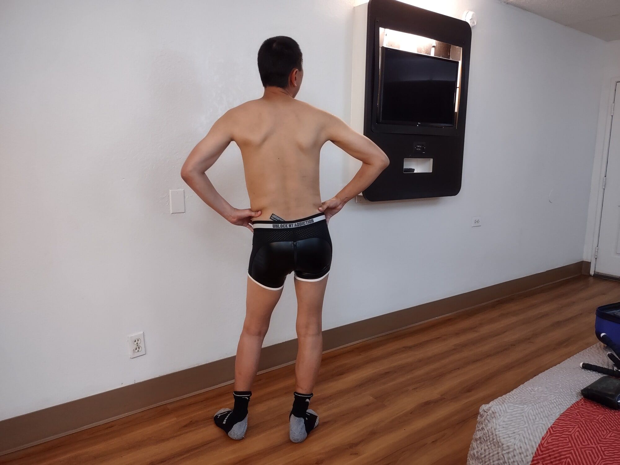 Asian enjoying some underwear and cock bondage at my hotel