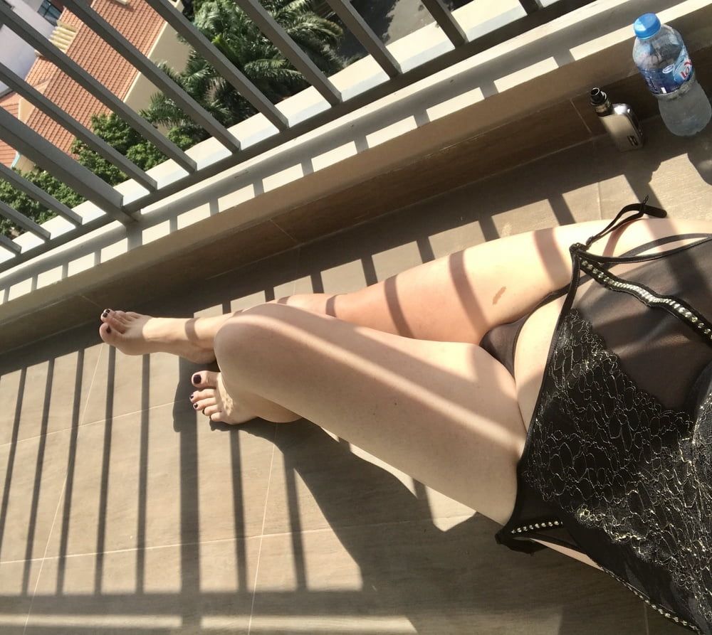 Sunbathing on the balcony  #57