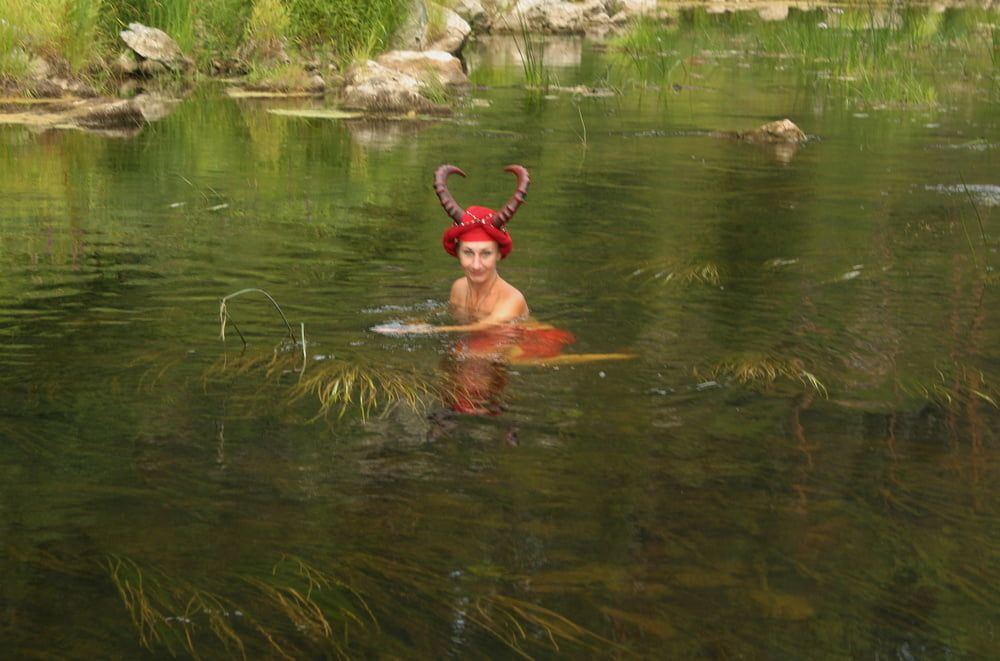 With Horns In Red Dress In Shallow River #35