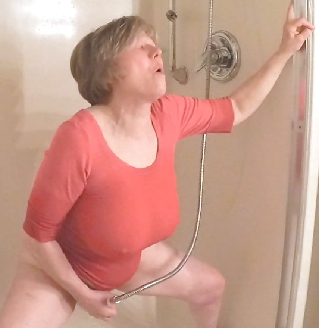 GILF masturbates in wet t-shirt #54