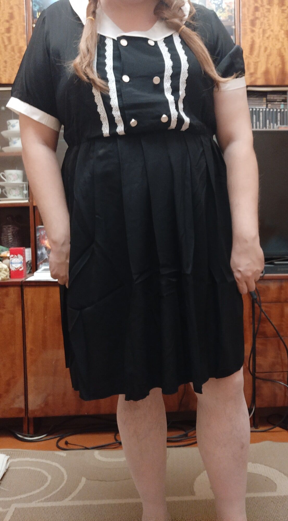 sissy Aleksa posing in new black dress
