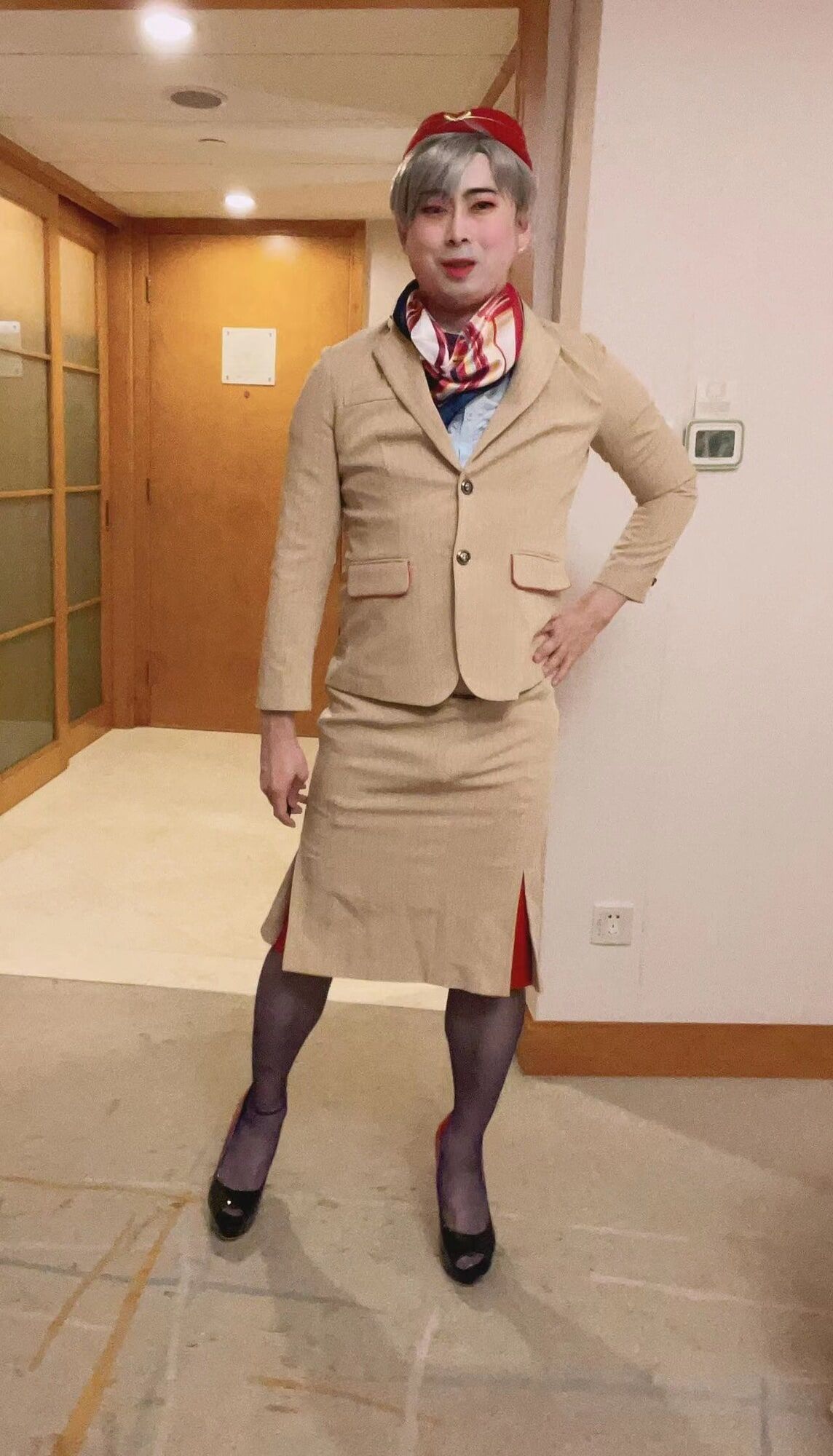 Asian femboy sissy in Emirates flight attendant dress #9