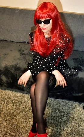 redhead wife with black stockings and red high heels         